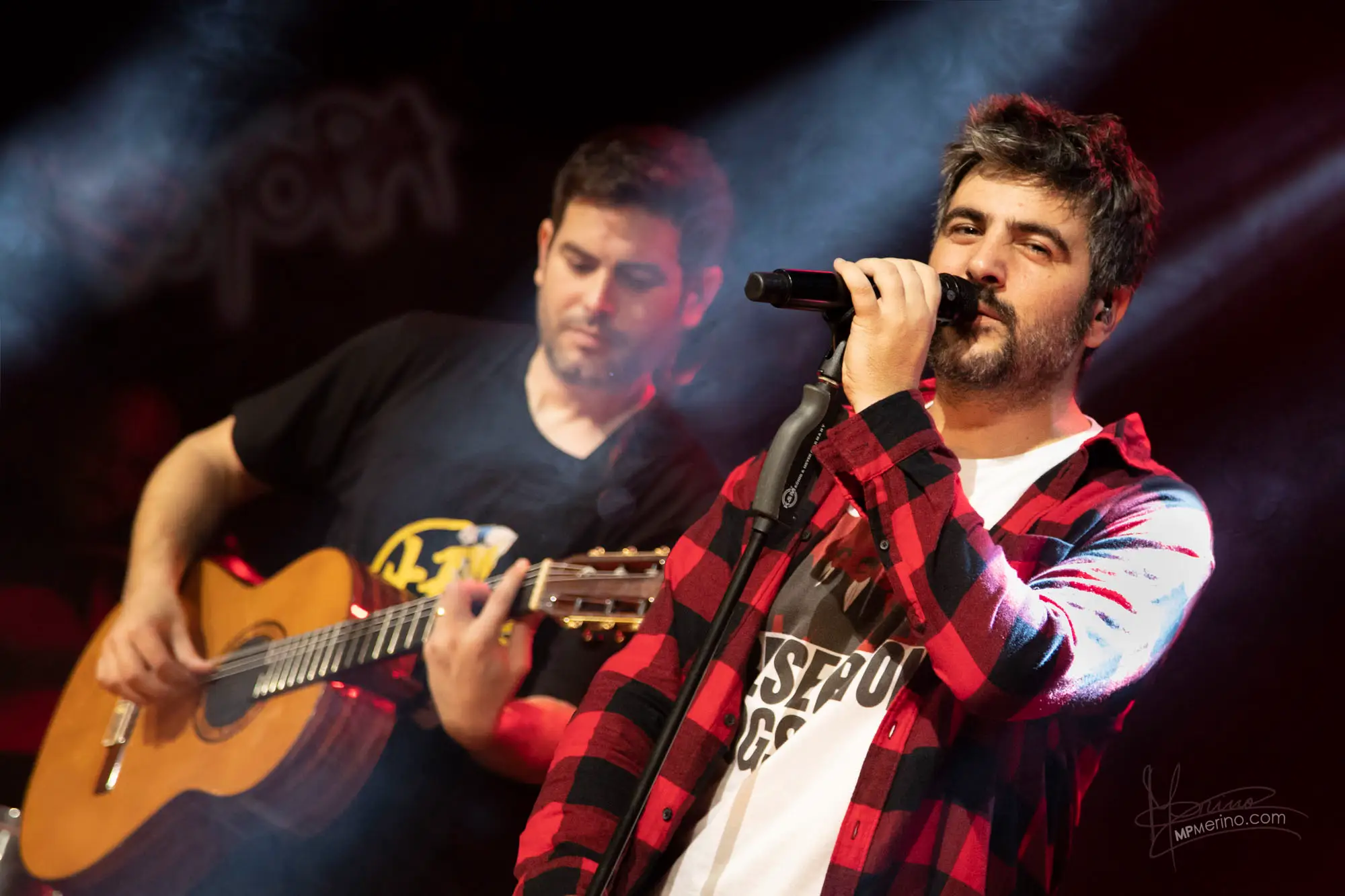 Concert photo, the members of the band Estopa playing live