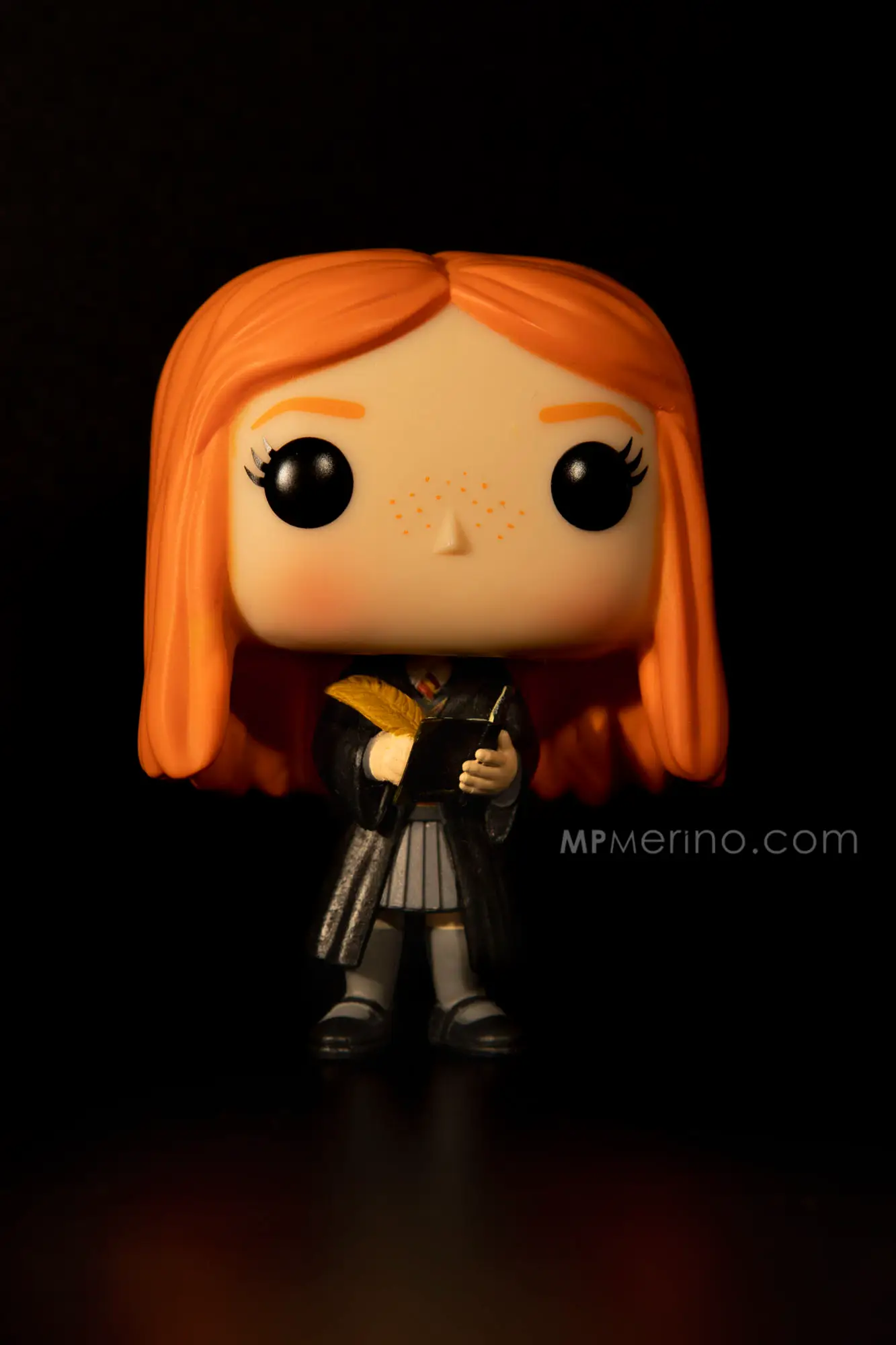 Close-up of a Funko Pop Figure of Harry Potter character Ginny Weasley