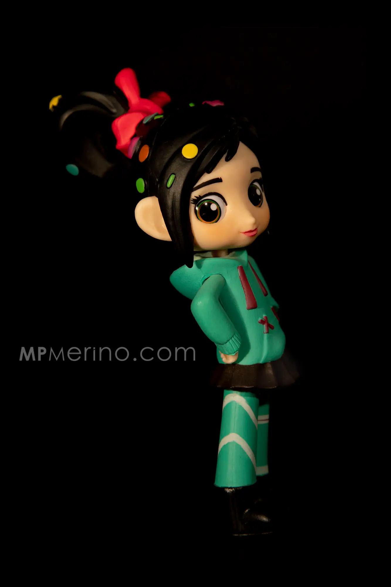 Close-up of a Q-Posket figure of Vanellope, the character from Wreck-It Ralph