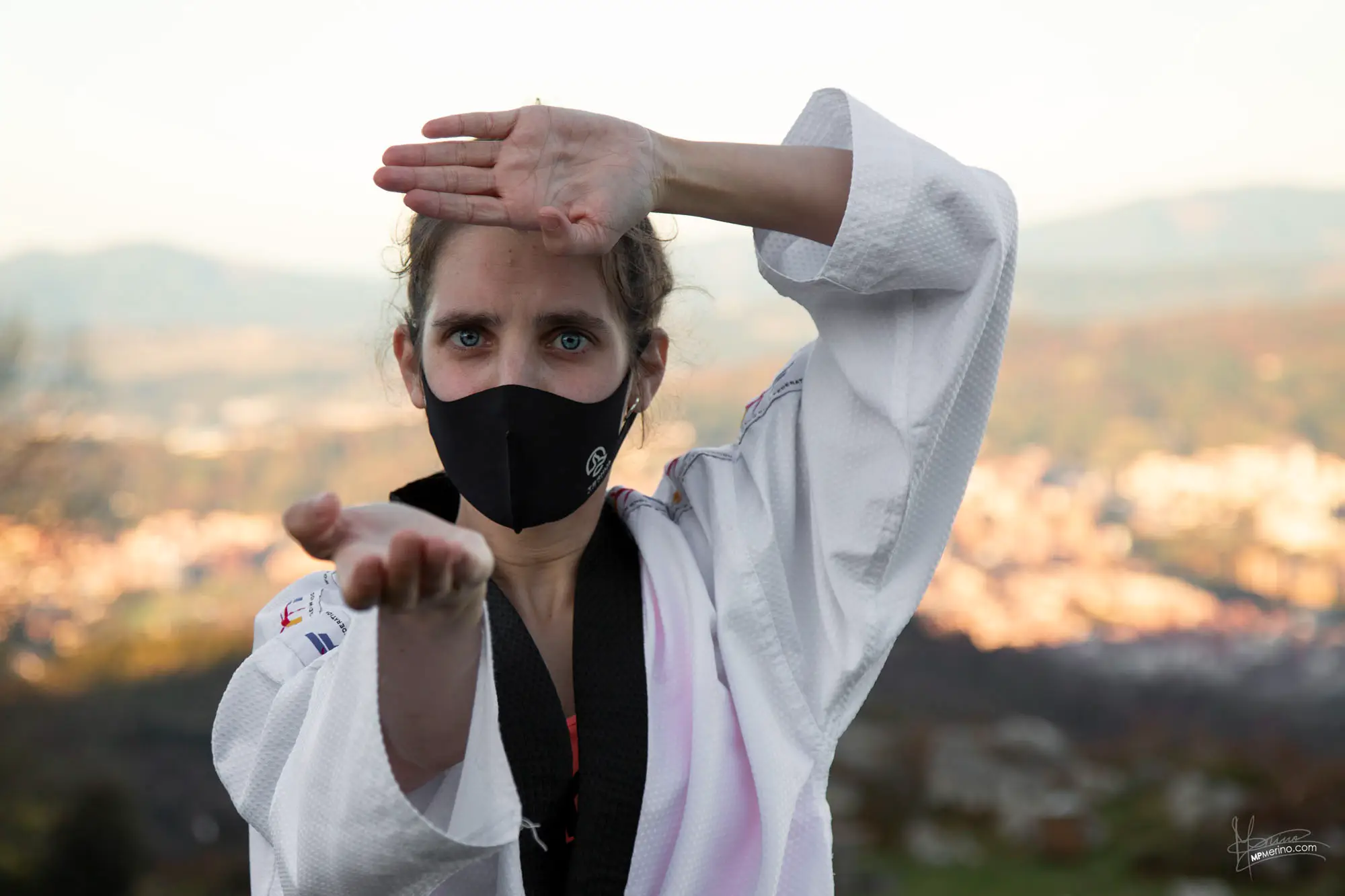 Portrait of a girl performing Taekwondo defence
