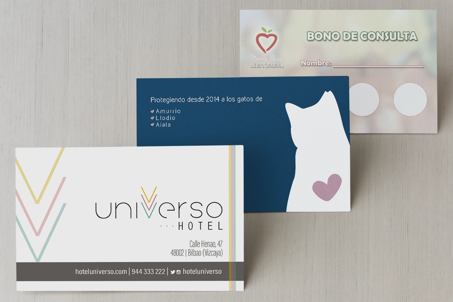 A few different business cards on a table